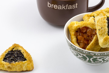Hamantaschen with poppy seed and sweet pear filling