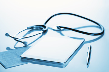 Medical still life with a tablet computer and a stethoscope