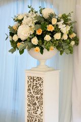 Wedding bouquet of  natural green flowers on stand