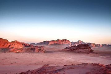 Scenic View Of Wadi Rum Against Clear Sky During Sunset, Arabian
