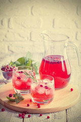 Fototapeta na wymiar Refreshing drink with cranberries