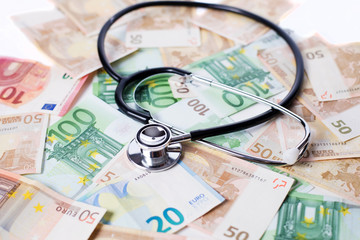 Stethoskop auf Geld