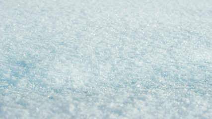 White blue Glitter bokeh from snow texture background