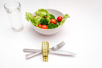 concept diet fresh vegetables on plate at white background