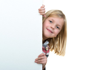 Cute blonde girl holding a blank sign