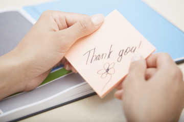 Thank you text on adhesive note