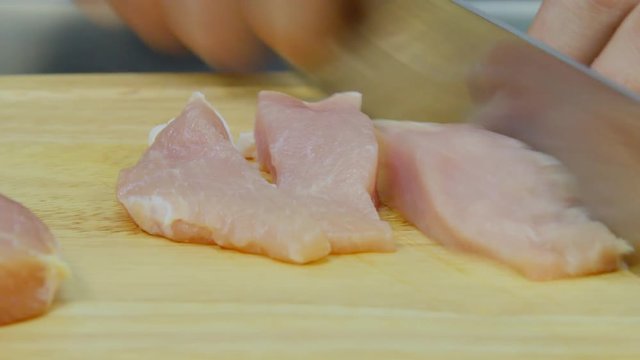 cut meat on a wooden Board.