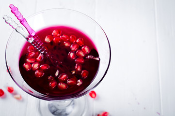pomegranate cocktail and ripe red fruit