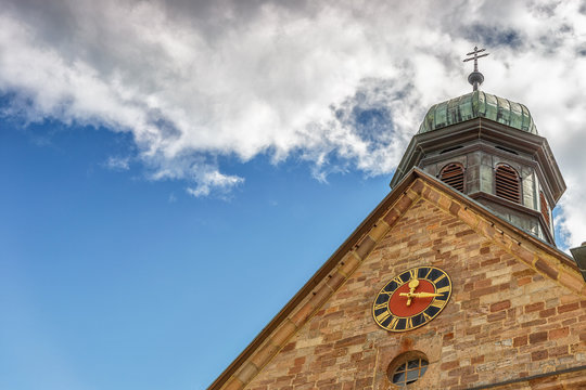 .Church dome with a clock on a sky background.Germany.