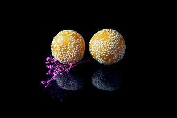 Sesame rice ball on black background, Traditional Thai dessert