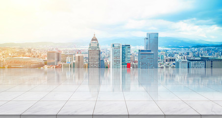 Business concept - Empty marble floor top with panoramic modern cityscape building bird eye aerial...