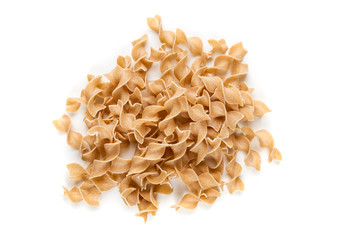 Whole wheat egg noodles isolated on a white background