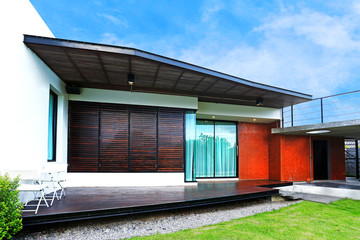 Obraz premium Architecture modern design in cement and wood with little garden and lawn