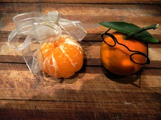 couple bride and groom ripe nectarine orange glasses and yellow nectarines cleaned with a bow with...