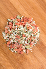 Vegetable soup mix isolated on a wood background