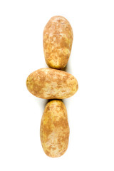 Three potatoes isolated on a white background