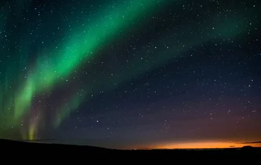 Fotobehang Noorderlicht (Aurora Borealis) in IJsland © MikeHubert