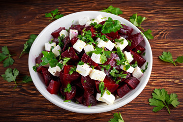 Healthy beetroot, feta cheese salad with parsley