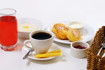 Set table with porridge cheesecakes coffee in cafe