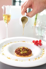 Fine dining - biscuit desert with cream