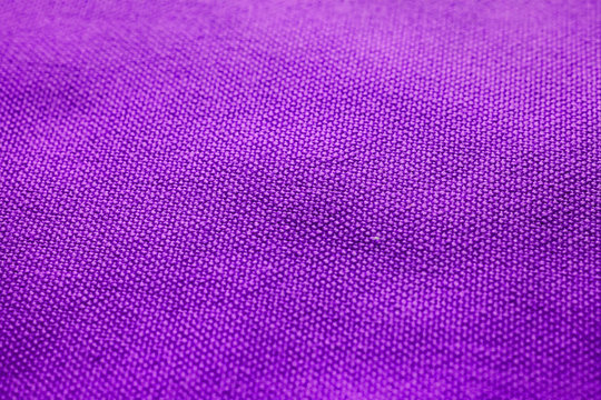Textura de tela morada. Fondo morado. Fondo de tela. Fondo y textura de tela burdeos. Fondo y textura para diseñadores. Purple abstract background and texture for designers