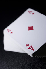 poker card stack deck on dark black background