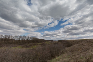 The movement of the thunderclouds over the fields of winter wheat