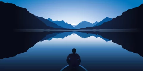Fotobehang Een zen-man, zittend aan de voorkant van een roeiboot, mediteert terwijl hij het kalme en prachtige landschap van een meer omringd door bergen aanschouwt. © pict rider