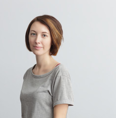 Obraz premium Woman in casual clothes calmly and confidently looking ahead