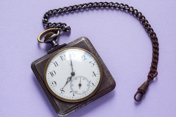 Vintage square watches on lilac