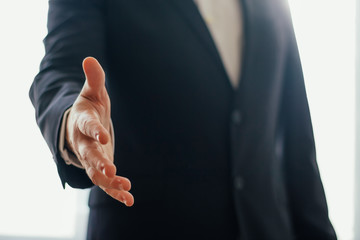 Obraz premium Businessman giving hand.