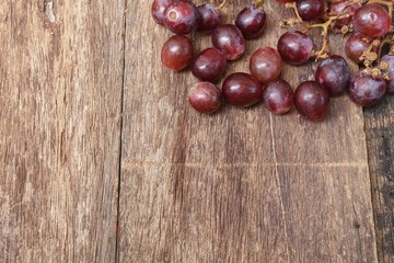 Grape red fresh Select focus with shallow depth of field on wooden table background