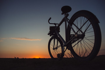 Fototapeta na wymiar bike sunset