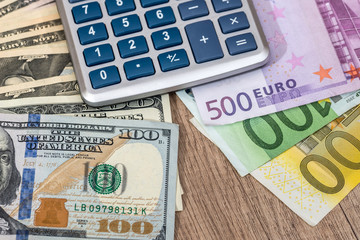 finance concept - euro vs dollar with calculator.