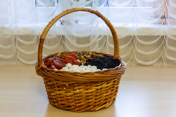 Fototapeta na wymiar Dried fruit in straw basket