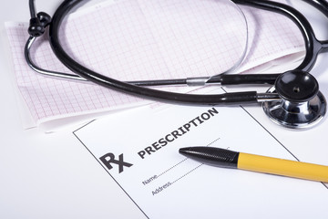 prescription form with stethoscope