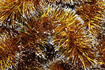 Background of the Christmas tinsel yellow