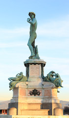 Sculpture of David isolated on blue sky at Piazza Michelangelo, Florence, Tuscany, Italy