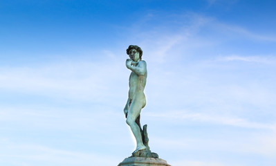 Sculpture of David isolated on blue sky at Piazza Michelangelo, Florence, Tuscany, Italy