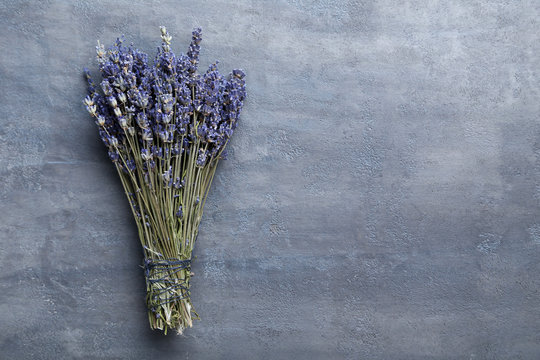 Bunch of lavender flowers on grey background