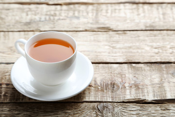 Cup of tea on a grey wooden table