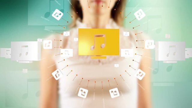 Young female pressing the screen then musical note symbol appearing. Futuristic touch screen concept.