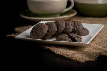 Chocolate cookie in white plate