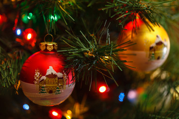 Beautiful Christmas ball on the tree branches.