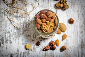 Healthy fruit - nuts on rustic table