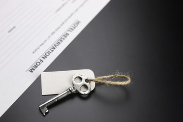 bell and the key at the reception in the hotel