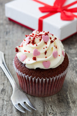 Valentine cupcakes on wooden background
