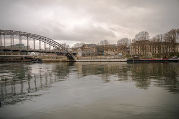 Naklejka premium Paris, view of the Seine with Austerlitz bridge and Austerlitz station, in winter