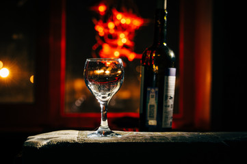two wine glasses and defocused lights at the restaurant