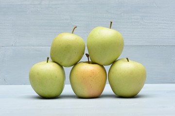 Set of pyramid green apples